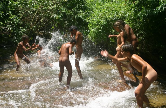 Young nudists of Brazil the bare bathe in the small river [Bodyart Collection]