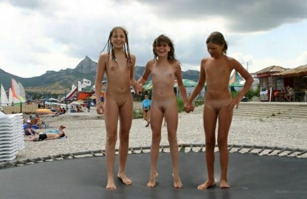 Young girls of the beauty nudists spring on a trampoline [Bodyart Collection]