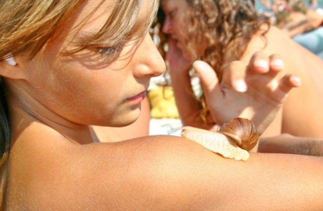 Adults and young nudists have a rest on a beach - Purenudism photo [Bodyart Collection]